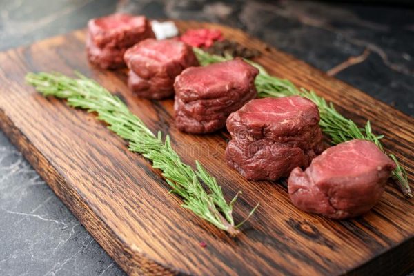 fresh-deer-fillet-cut-pieces-lies-wooden-board-herbs-salt-raw-deer-tenderloin-board-160458818